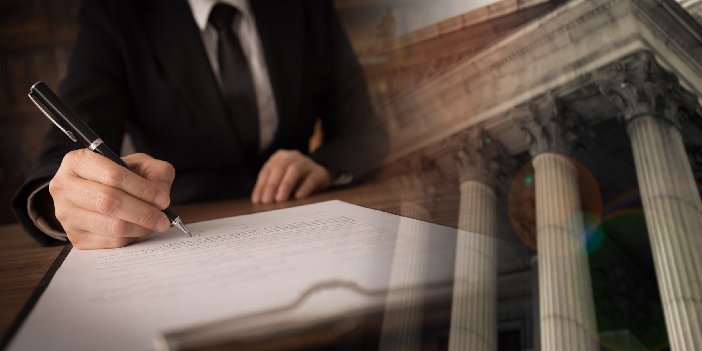 Lawyer or attorney signing legal document and agreement with court background.